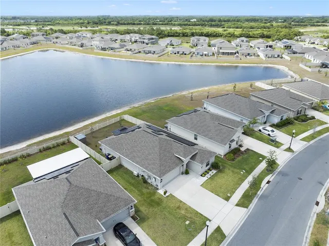 an aerial view of a house with garden space sitting space