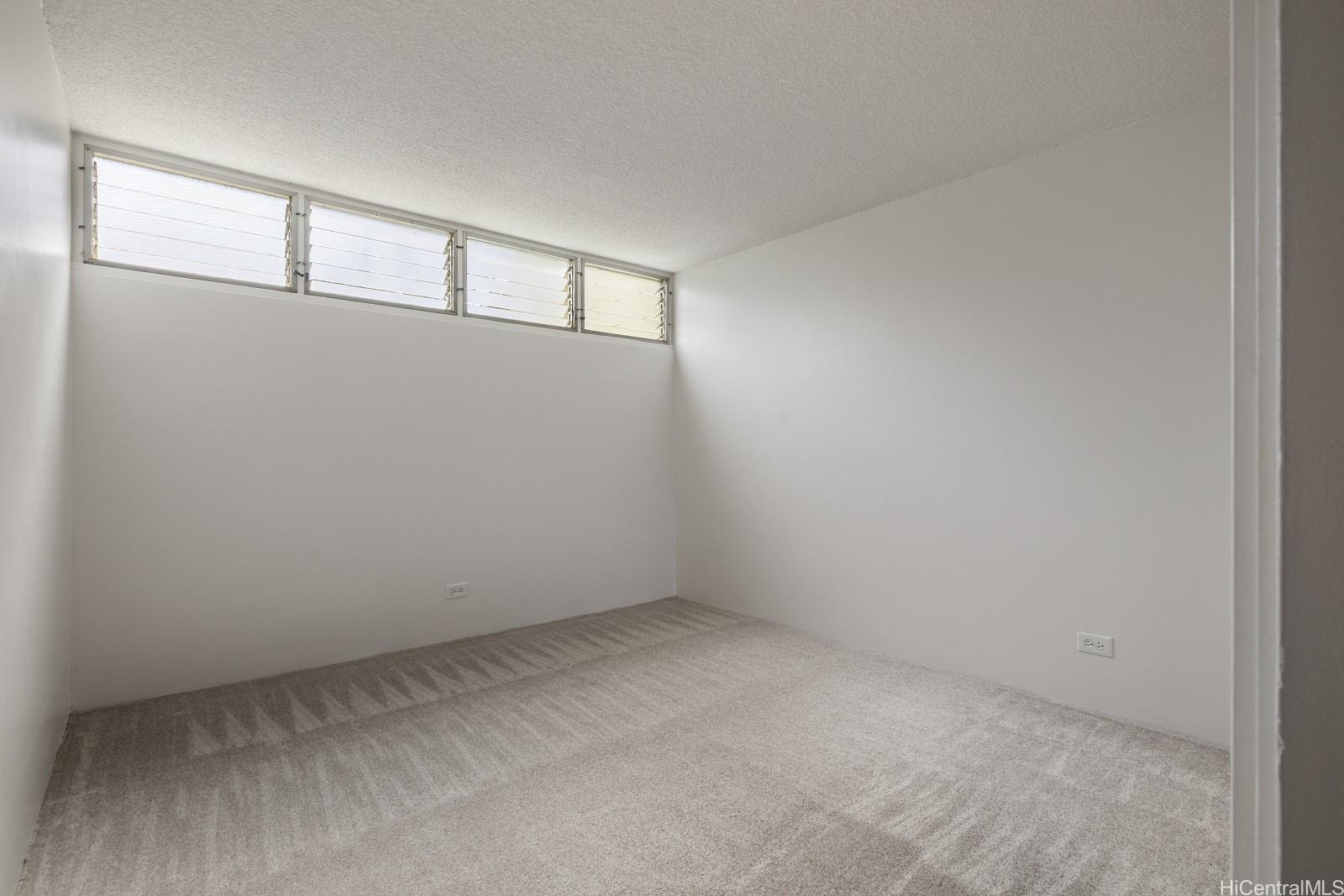 3103 Pualei Circle, Unit 203 Honolulu, HI 96815 - Photo 15 of 25 Not to be outdone, the 2nd bedroom is large too.