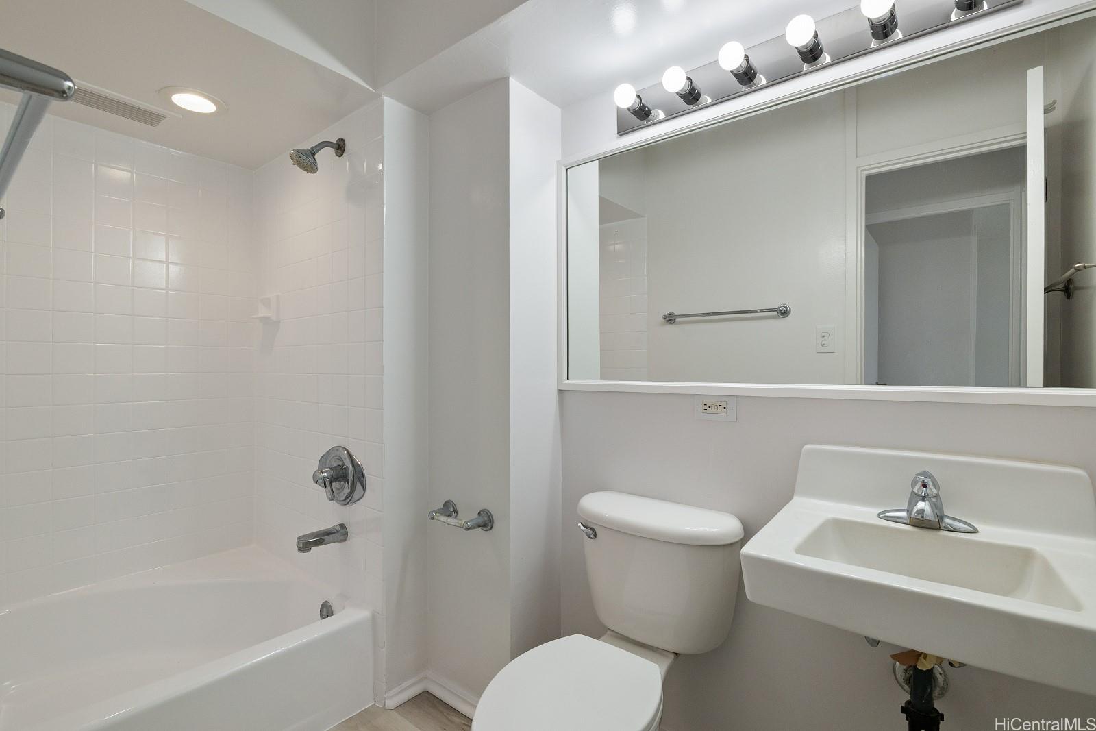 3103 Pualei Circle, Unit 203 Honolulu, HI 96815 - Photo 17 of 25 Your guests will love the hallway bathroom.