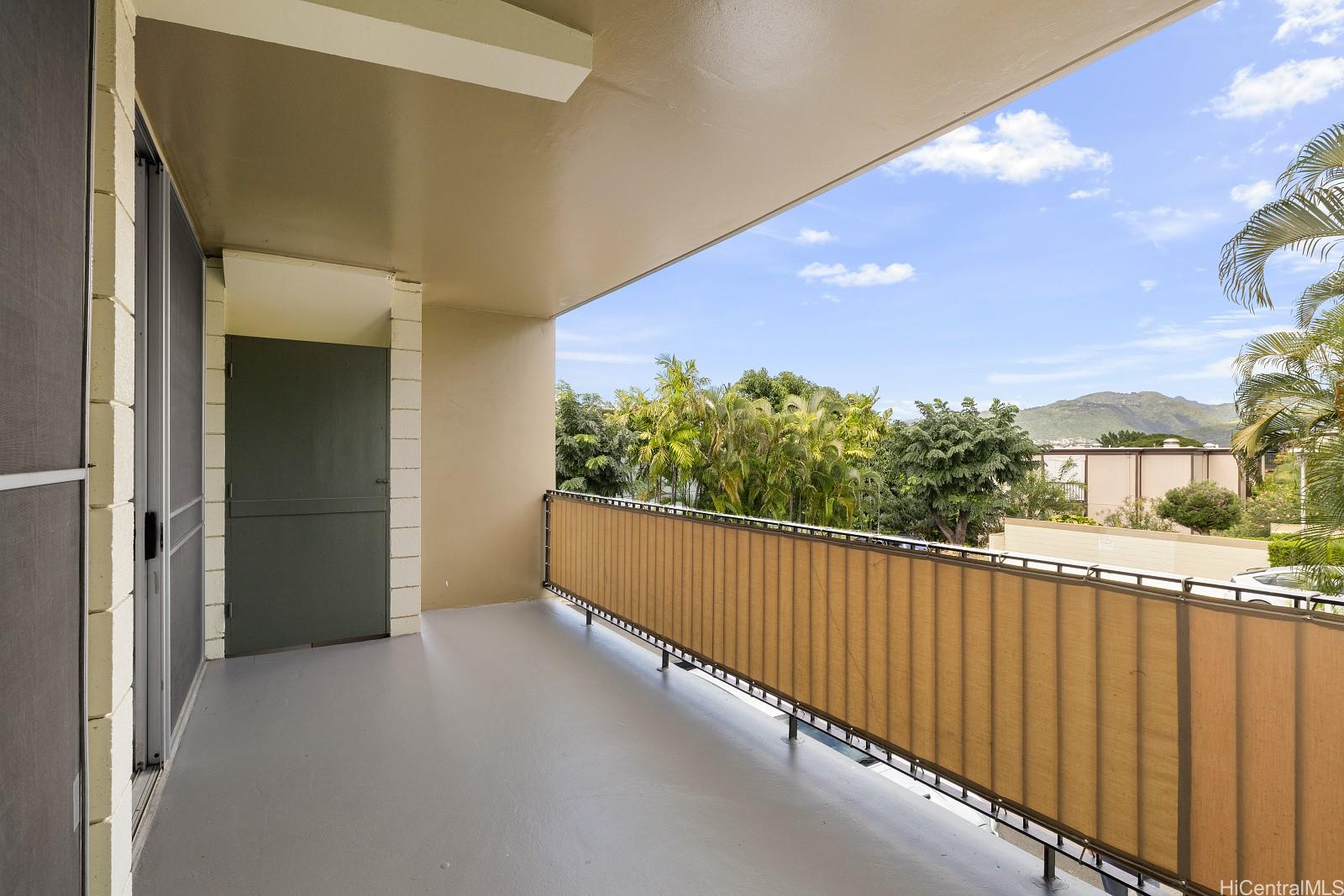 3103 Pualei Circle, Unit 203 Honolulu, HI 96815 - Photo 2 of 25 This spacious private lanai could be used as your dining room or an extra living space.