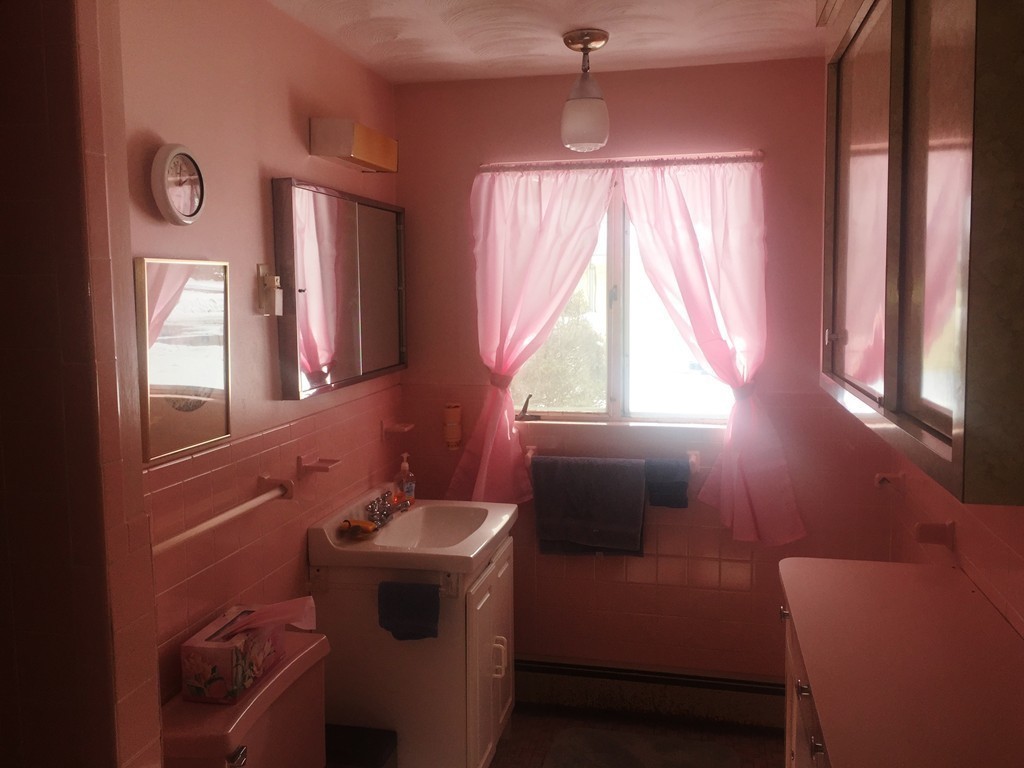 12 Nadine Road Framingham, MA 01701 - Photo 13 of 21 a bathroom with a sink toilet and mirror