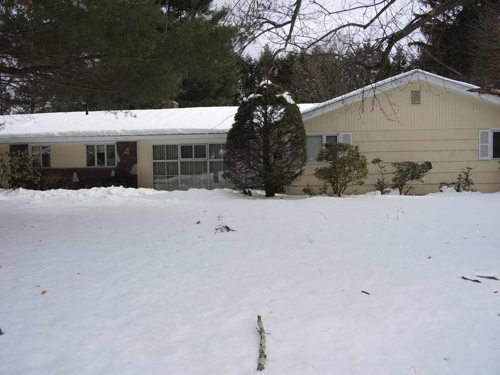12 Nadine Road Framingham, MA 01701 - Photo 19 of 21 a view of house with a yard covered in snow