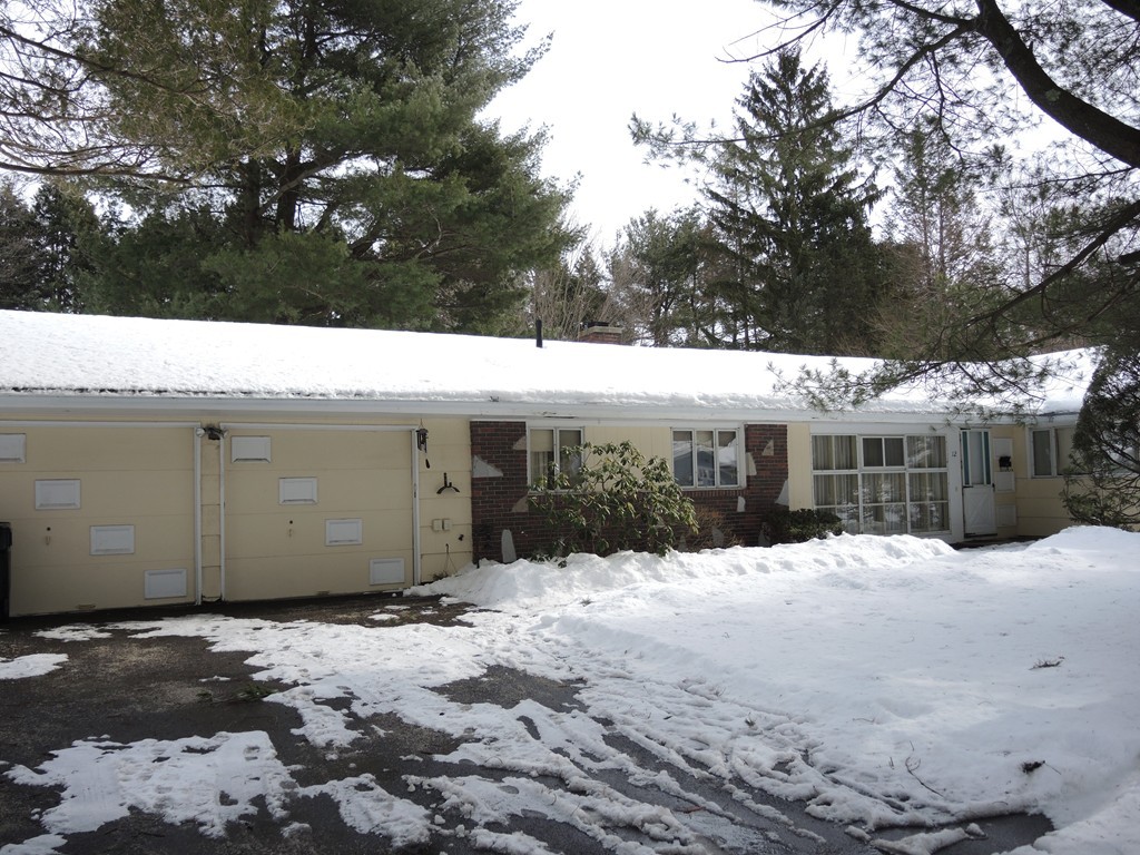 12 Nadine Road Framingham, MA 01701 - Photo 20 of 21 a view of a house with a yard covered in snow