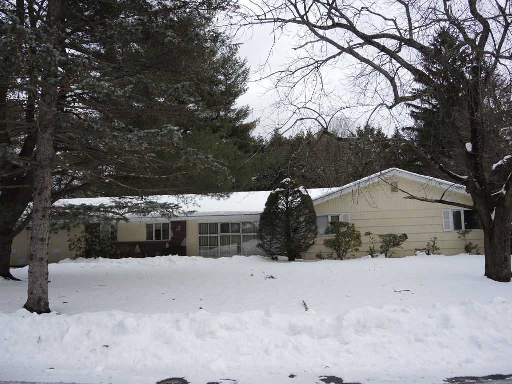 12 Nadine Road Framingham, MA 01701 - Photo 2 of 21 a view of house covered in snow