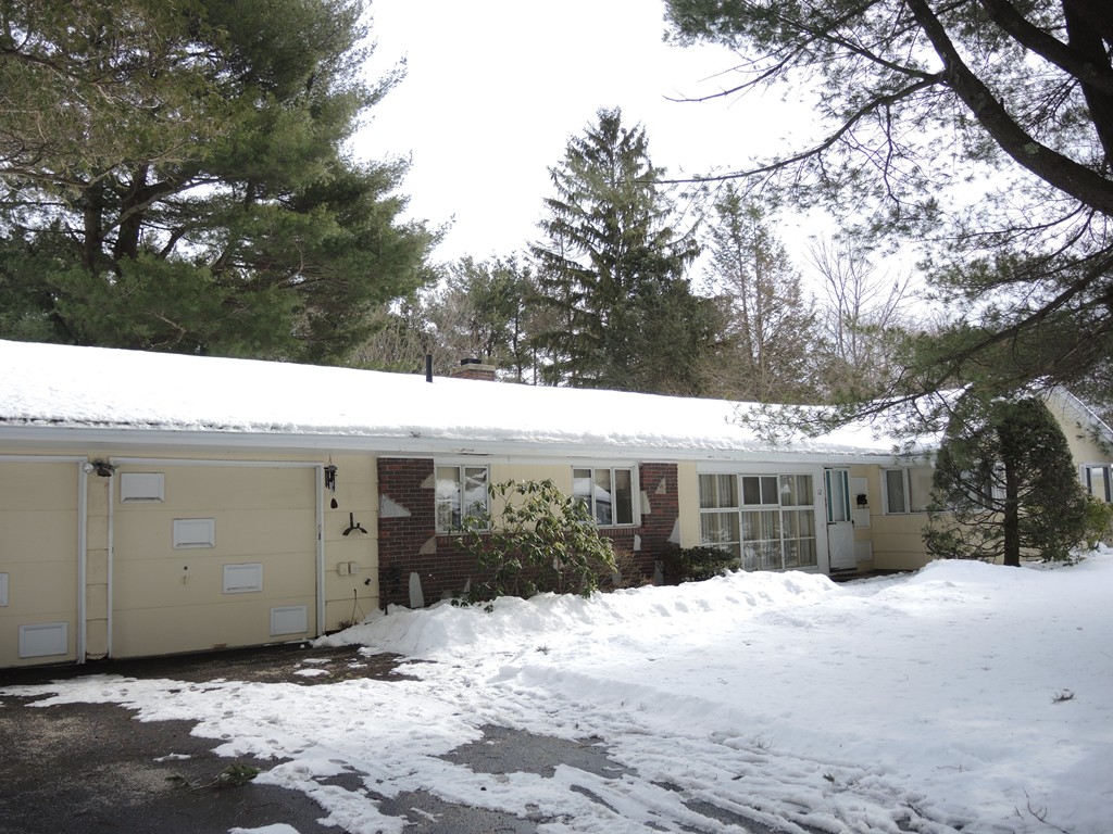 12 Nadine Road Framingham, MA 01701 - Photo 21 of 21 a view of a house with a yard covered in snow