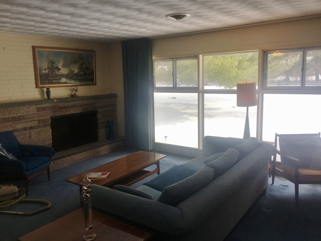 12 Nadine Road Framingham, MA 01701 - Photo 6 of 21 a living room with furniture and a fireplace