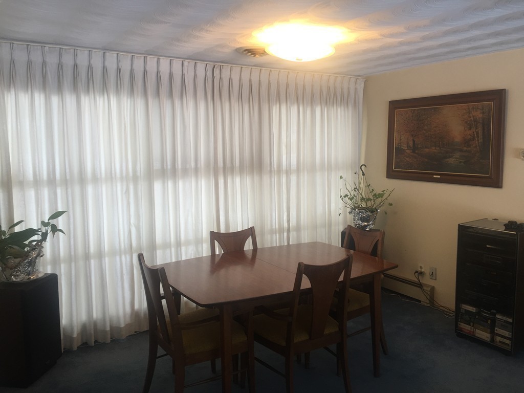 12 Nadine Road Framingham, MA 01701 - Photo 8 of 21 a dining room with furniture and window