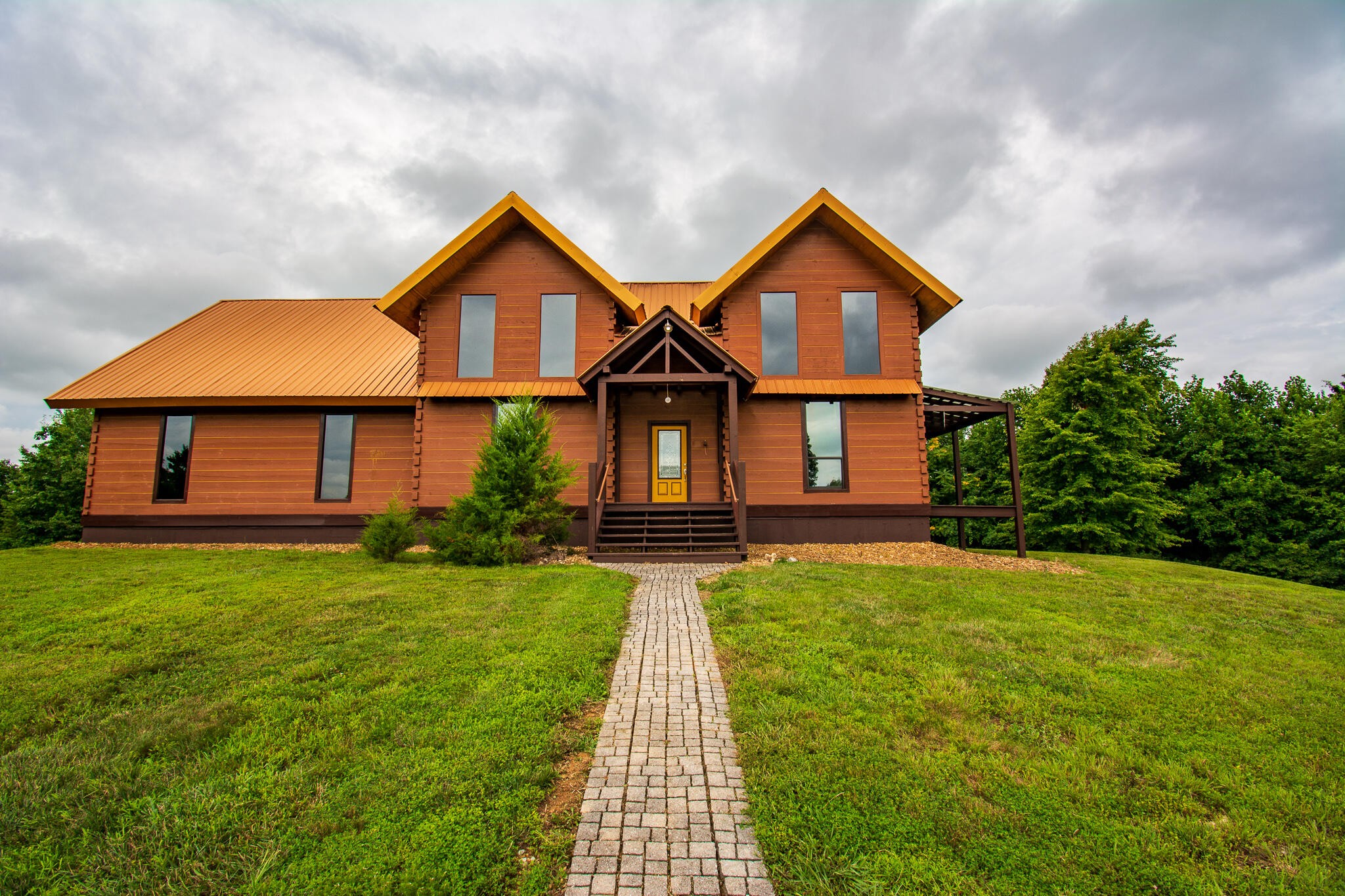 3600 Lynn Road Philadelphia, TN 37846 - Photo 1 of 37 a front view of a house with yard