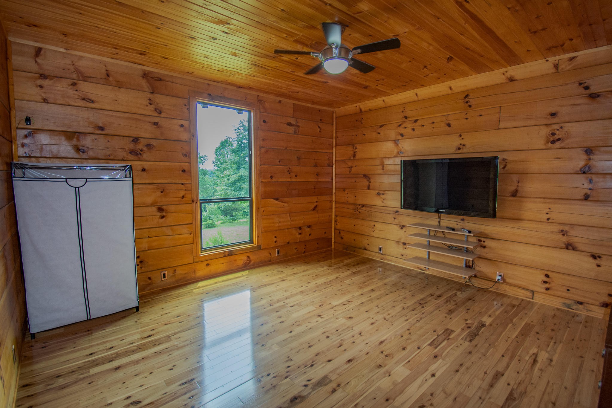 3600 Lynn Road Philadelphia, TN 37846 - Photo 13 of 37 a view of a livingroom with wooden floor and a fireplace