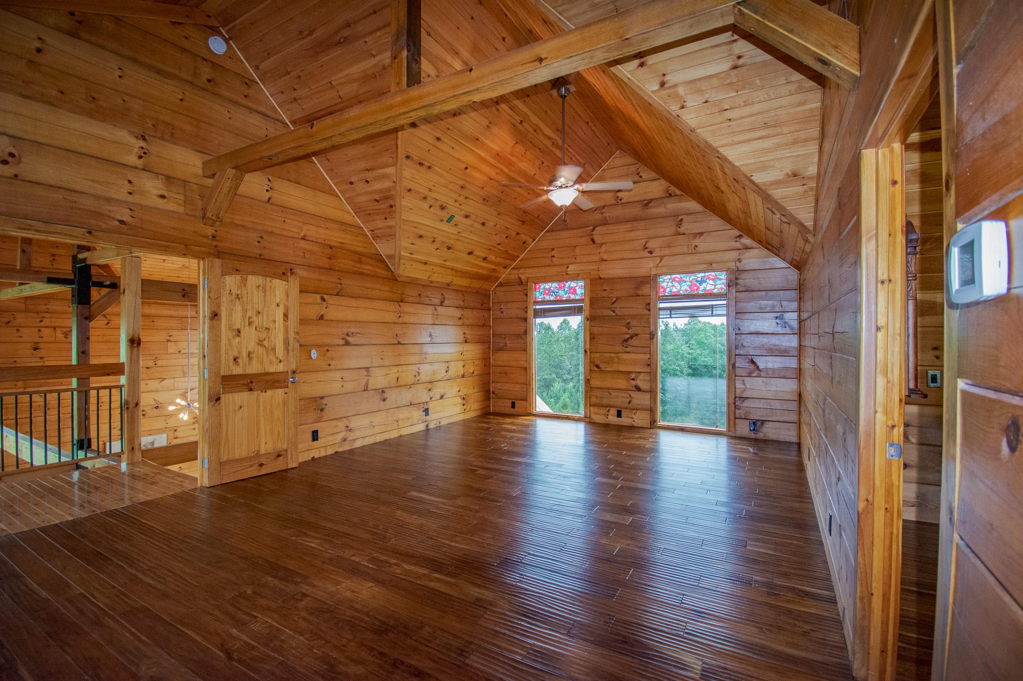 3600 Lynn Road Philadelphia, TN 37846 - Photo 16 of 37 a view of an empty room with wooden floor and a window