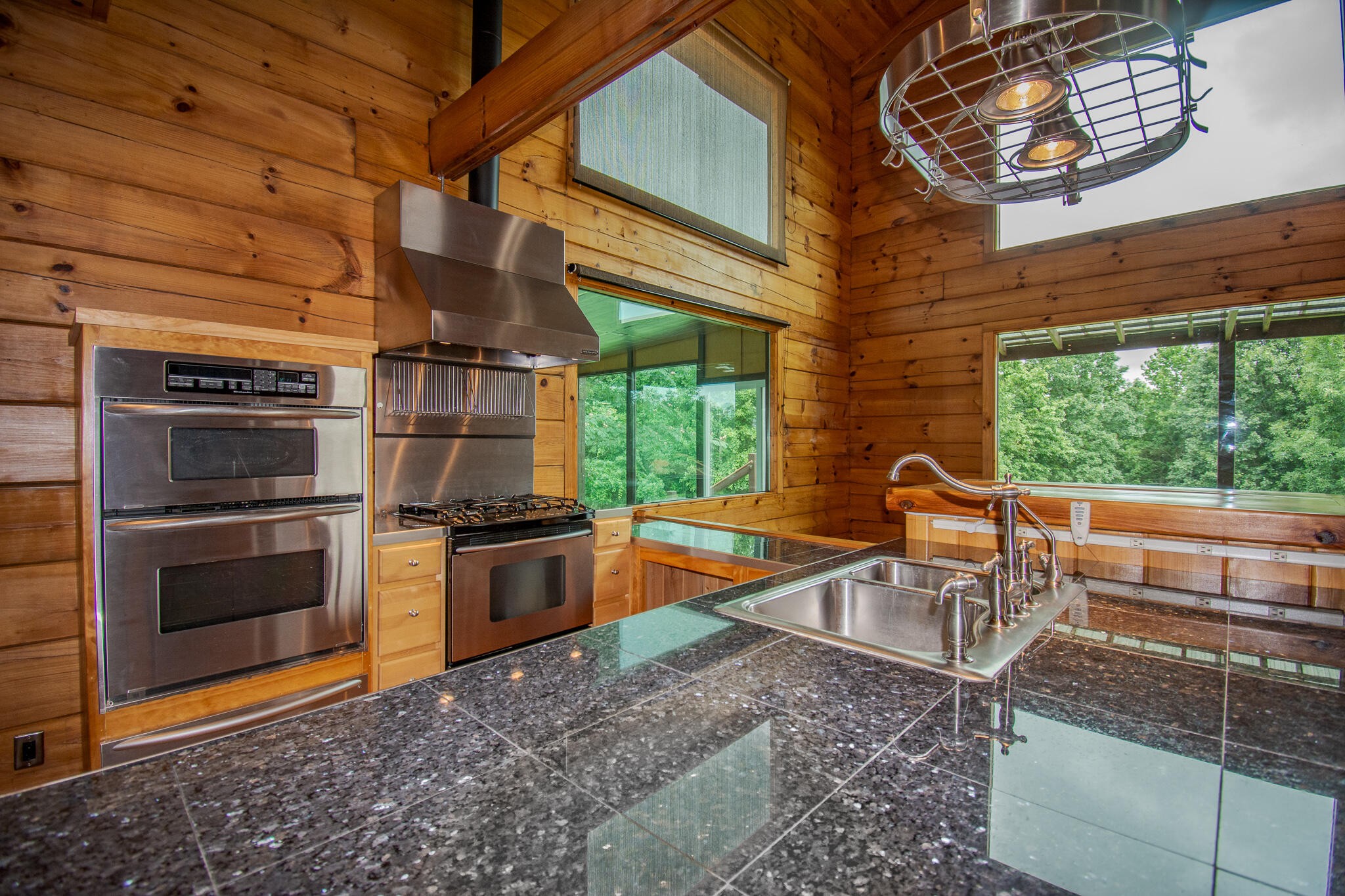 3600 Lynn Road Philadelphia, TN 37846 - Photo 8 of 37 a kitchen with stainless steel appliances granite countertop a sink stove and refrigerator