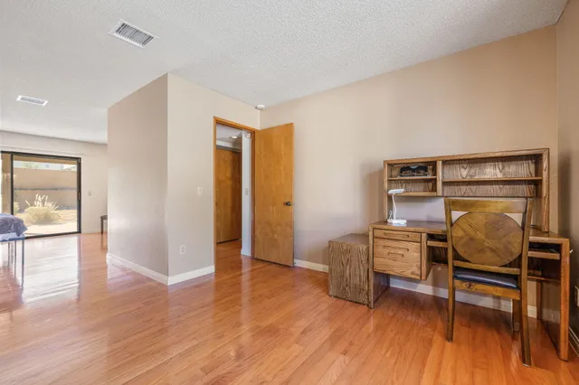 a bathroom with a glass door shower