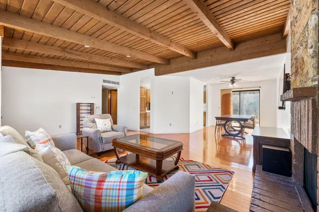 a kitchen with a stove a sink and a refrigerator