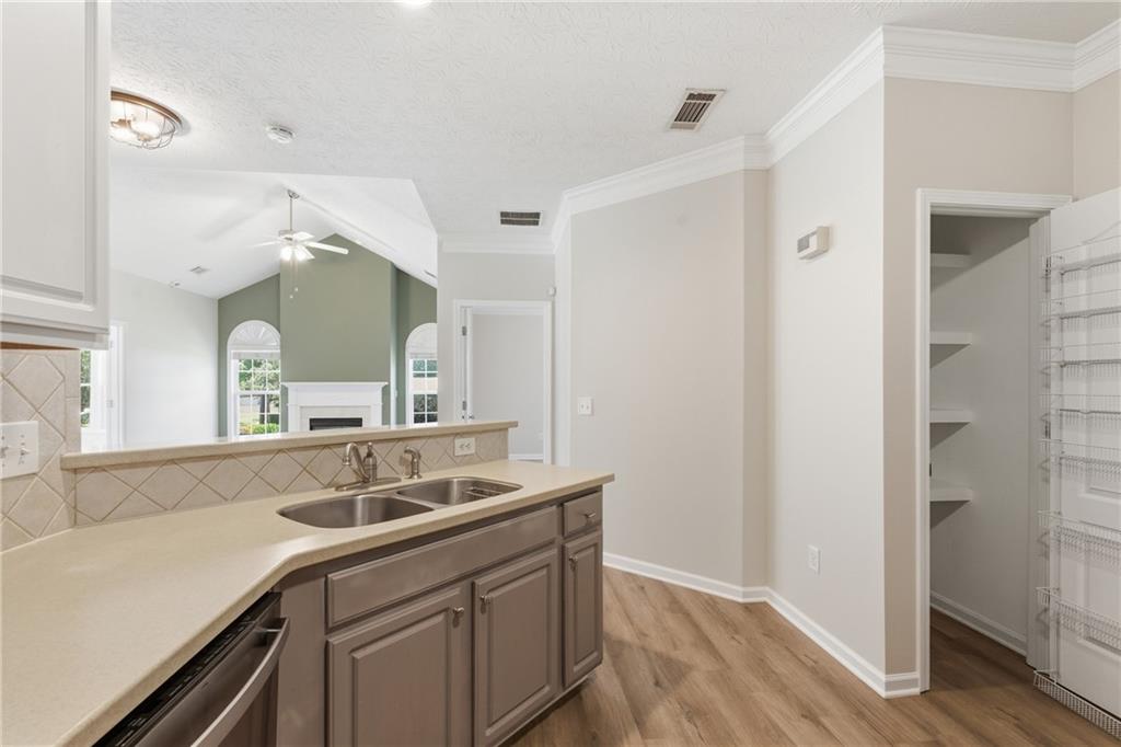4533 Caleb Crossing, Unit 18 Powder Springs, GA 30127 - Photo 7 of 24 a bathroom with a sink and a mirror
