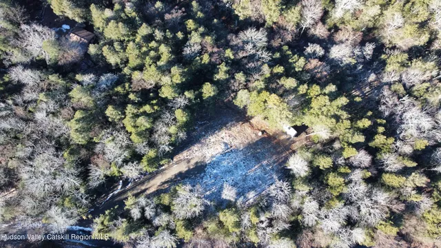a view of a backyard of a house