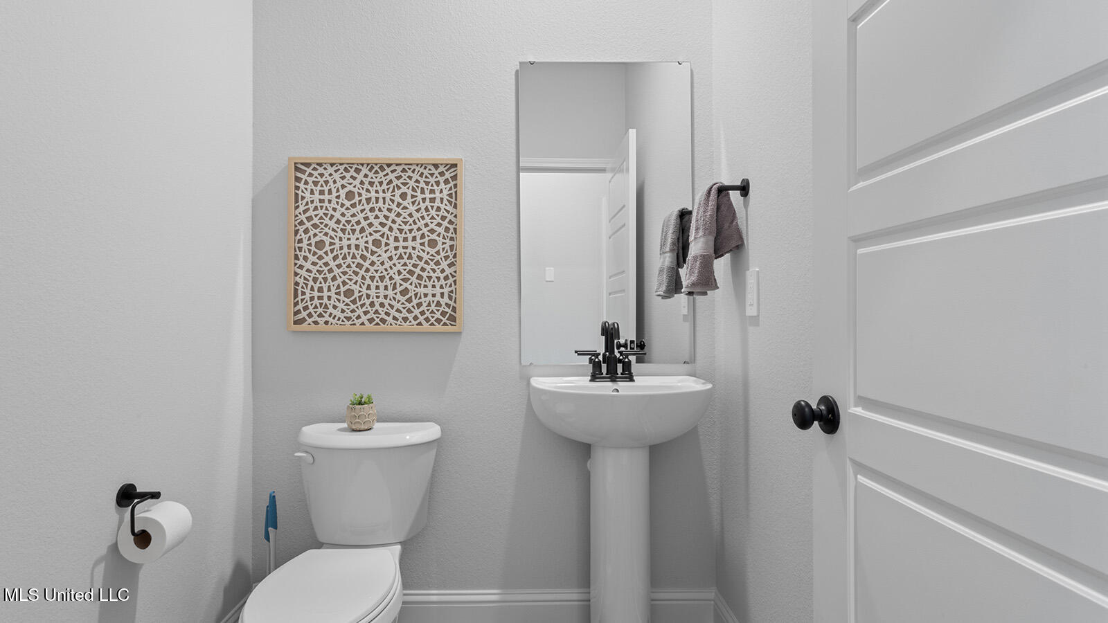 14411 South Swan Road Gulfport, MS 39503 - Photo 39 of 42 Powder Room