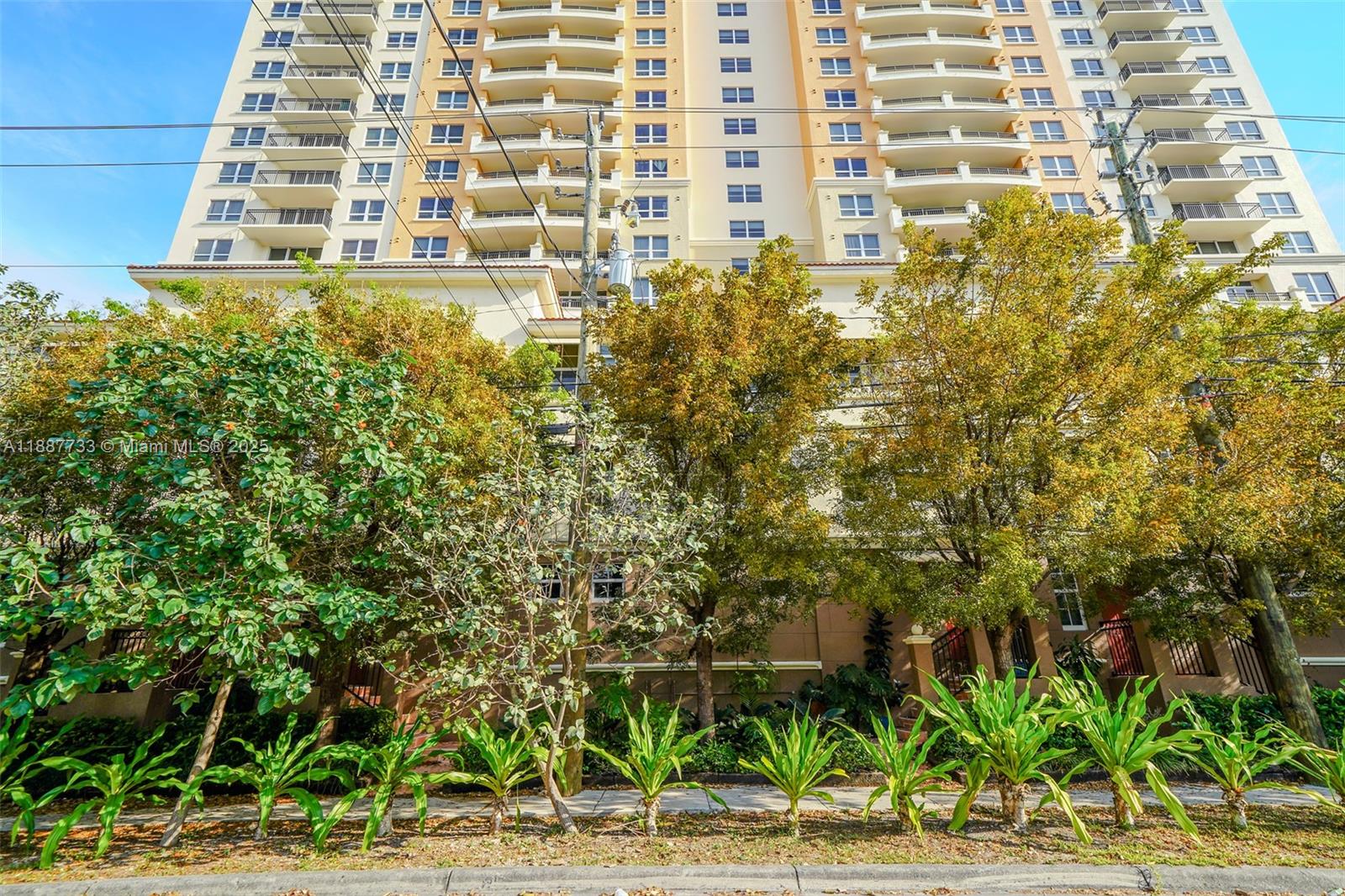 3232 Southwest 22nd Terrace, Unit TH 115 Miami, FL 33145 - Photo 2 of 17 a view of a building