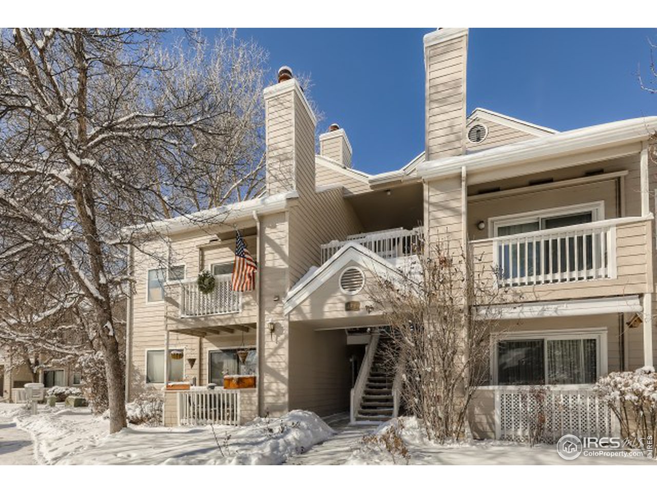 4915 Twin Lakes Road Boulder, CO 80301 - Photo 2 of 15 a view of a blue house with large windows