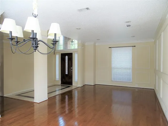a view of dining room with wooden floor