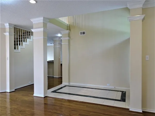 a view of entryway with wooden floor