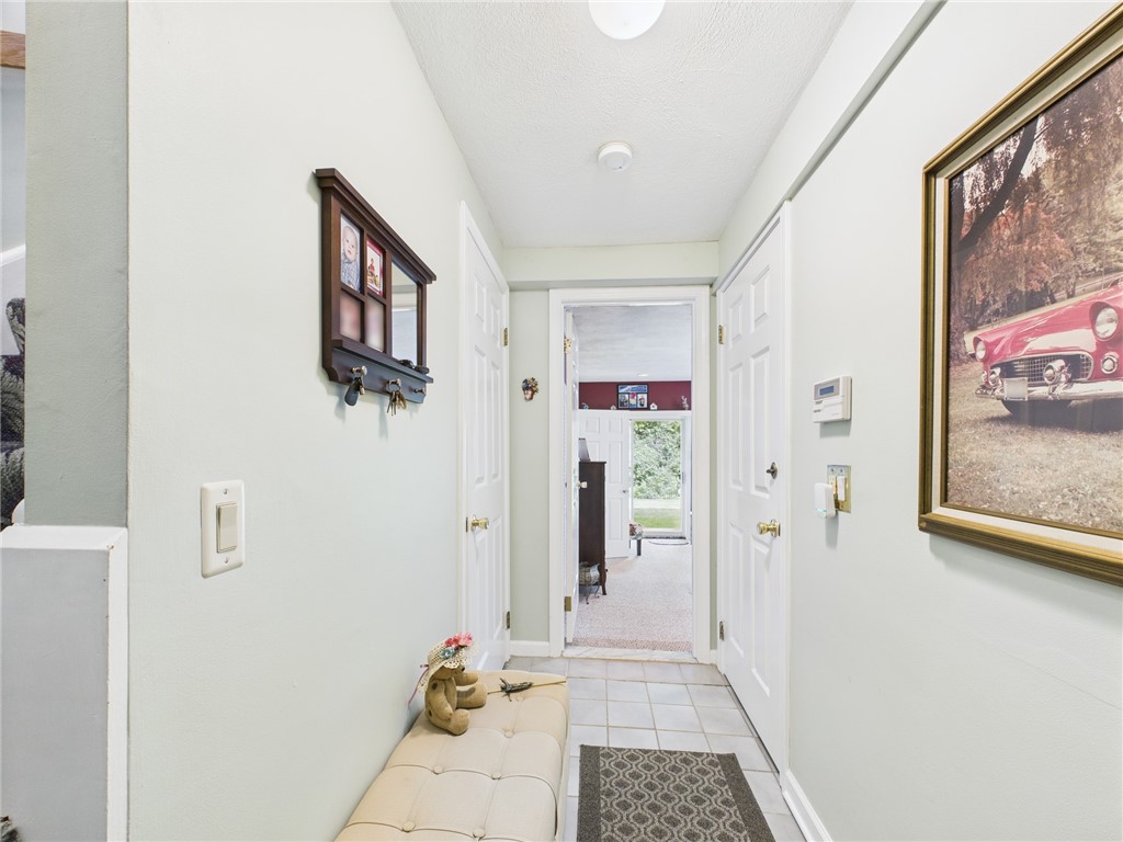 200 Cannon Street, Unit 130 Cranston, RI 02920 - Photo 14 of 26 Hallway to the walkout 3rd bedroom suite. Great location for a gallery of artwork!