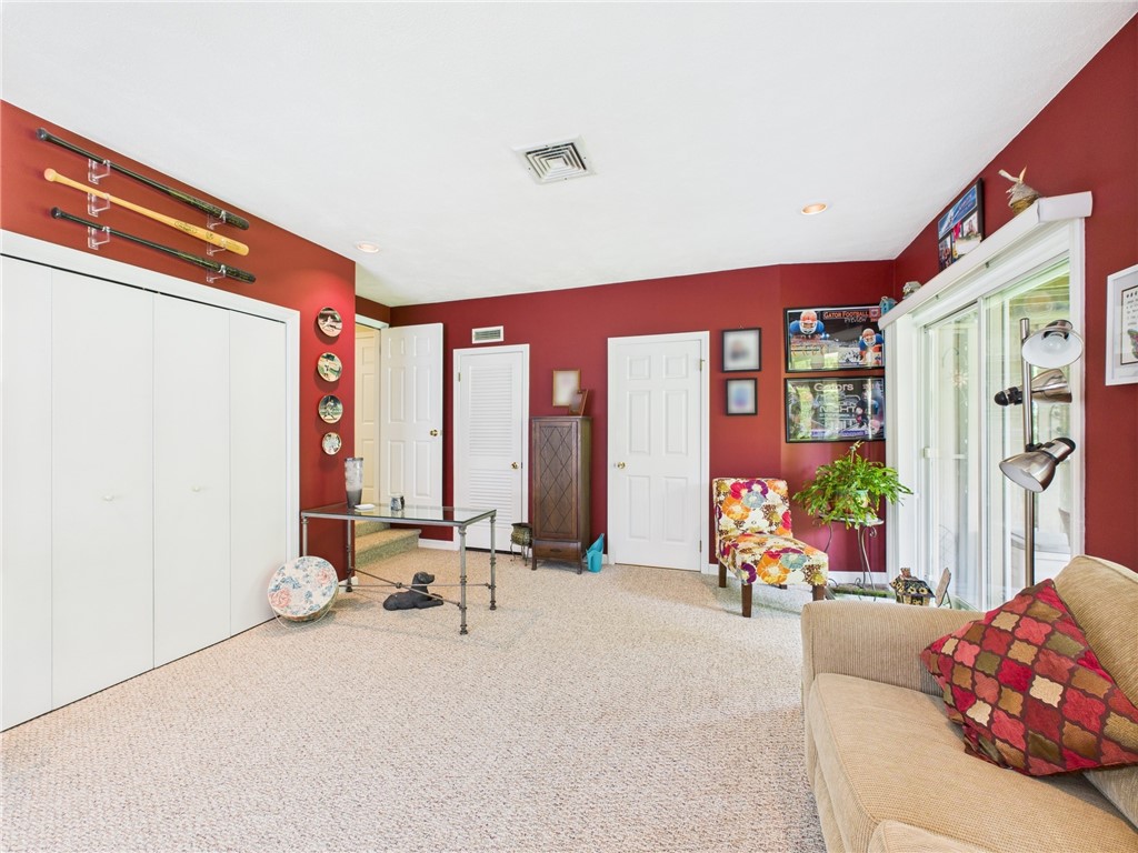 200 Cannon Street, Unit 130 Cranston, RI 02920 - Photo 17 of 26 The wall to the left offers expansive closet space for guests... or for storage if this is used as a family room.