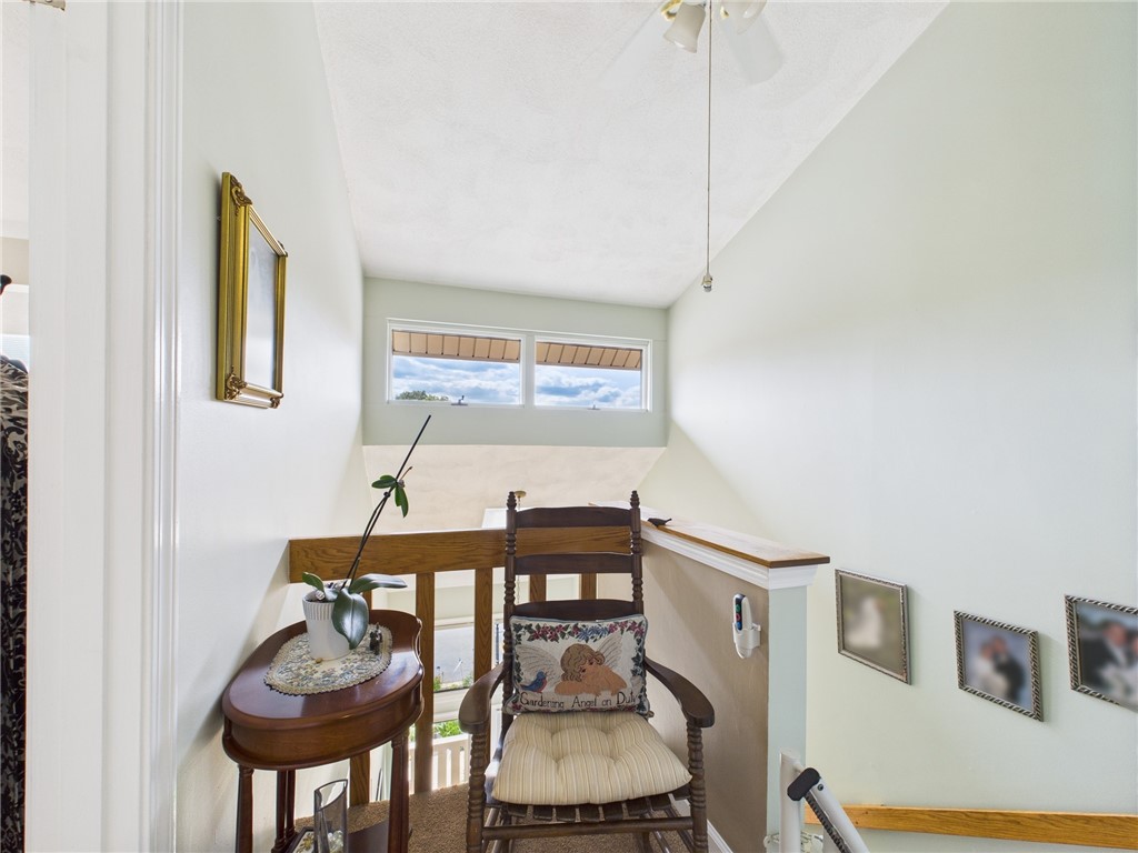 200 Cannon Street, Unit 130 Cranston, RI 02920 - Photo 18 of 26 Transom window lends natural lighting for the stairs to the upper level landing, laundry, bathroom and 2 bedrooms.