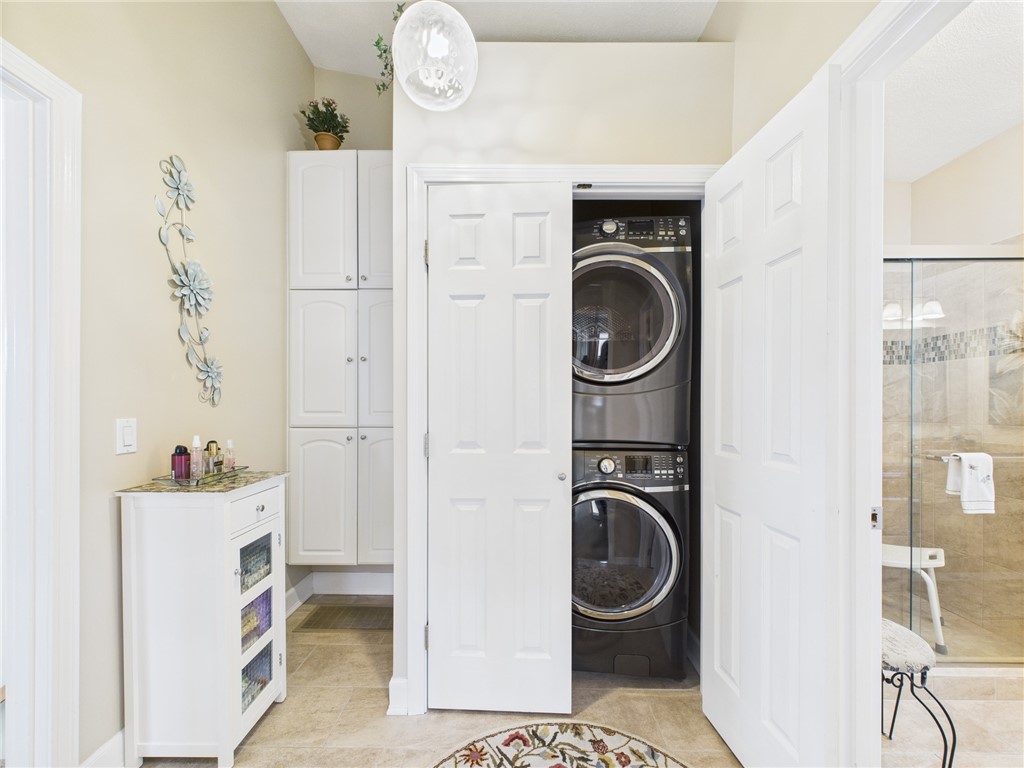 200 Cannon Street, Unit 130 Cranston, RI 02920 - Photo 20 of 26 Convenient laundry facilities & cupboard space from the hallway landing on 2nd.