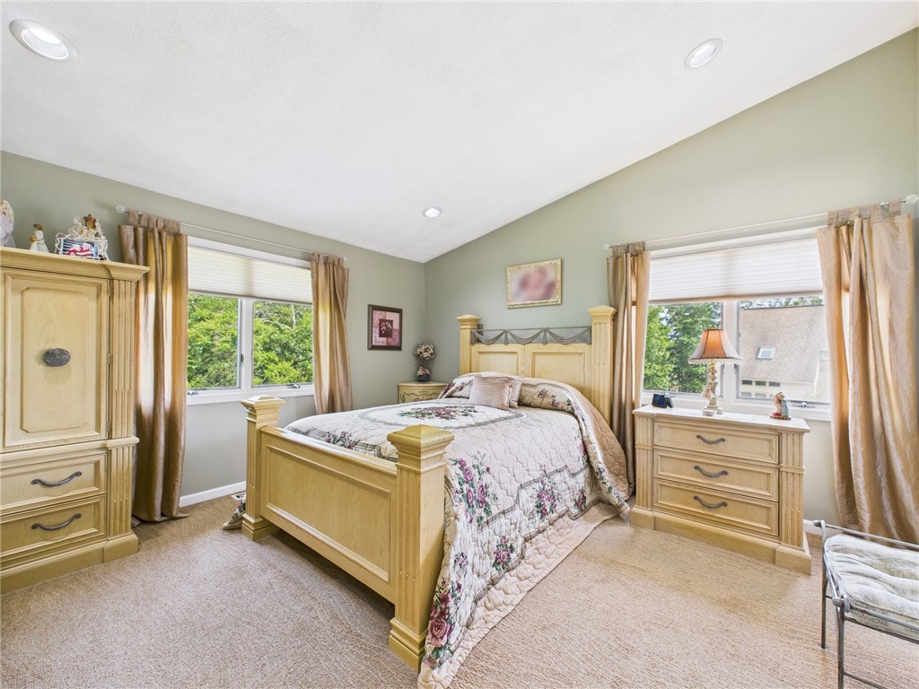 200 Cannon Street, Unit 130 Cranston, RI 02920 - Photo 21 of 26 Airy and deluxe primary bedroom.