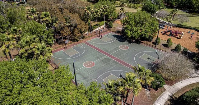an aerial view of a house with outdoor space