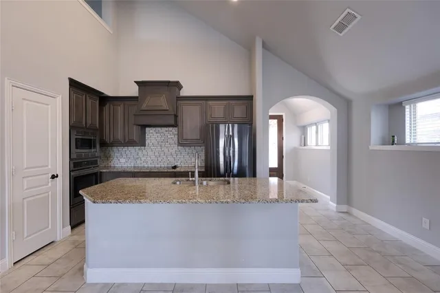 a large tub sitting in a kitchen