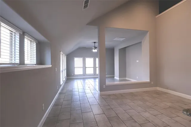 a view of an empty room and window