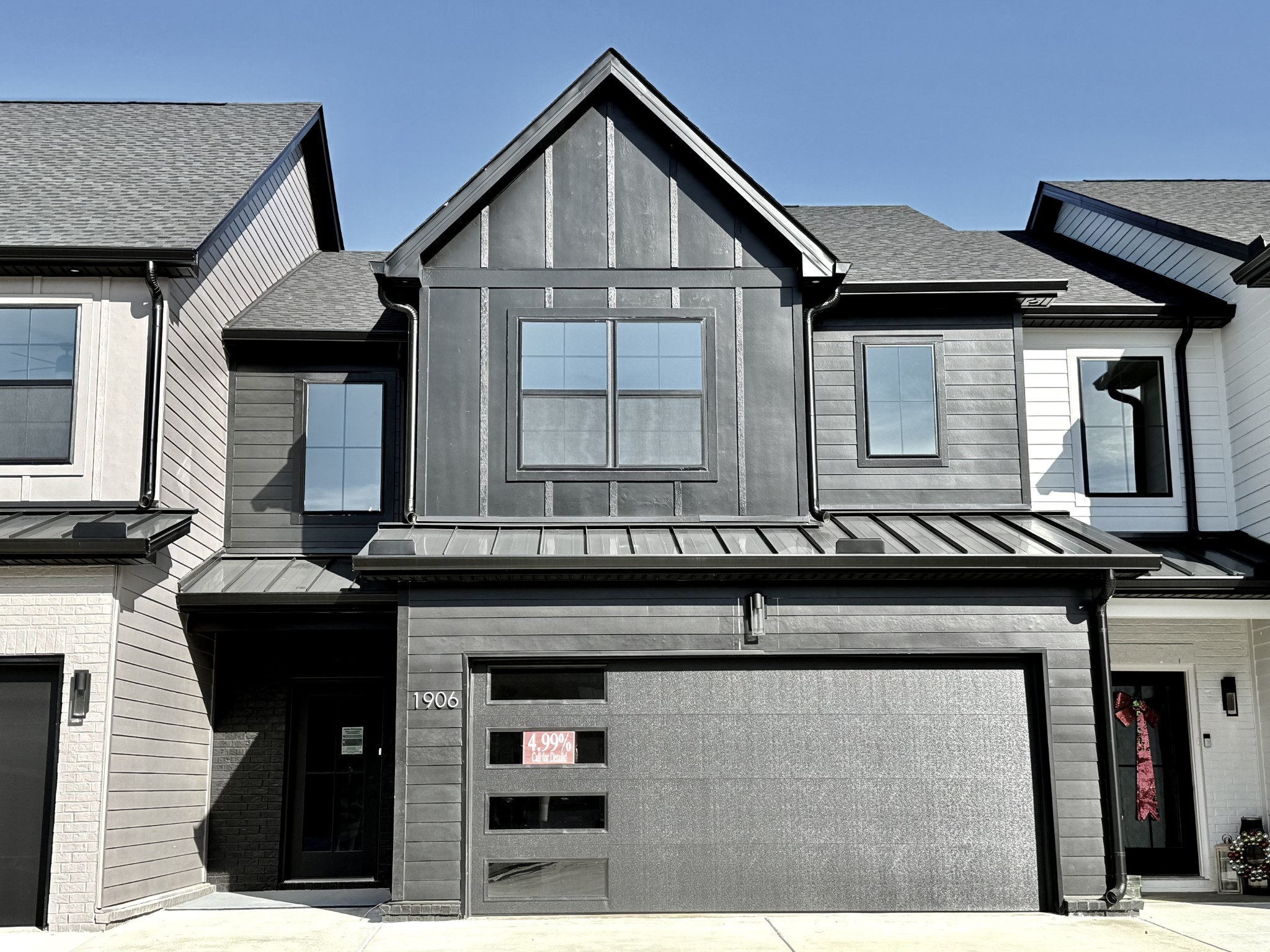 a front view of house with garage