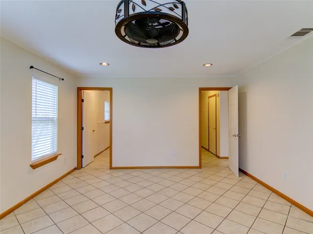 a view of an empty room and window