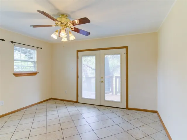 a view of backyard with deck and wooden floor