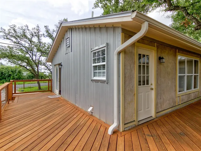 a view of a terrace with trees