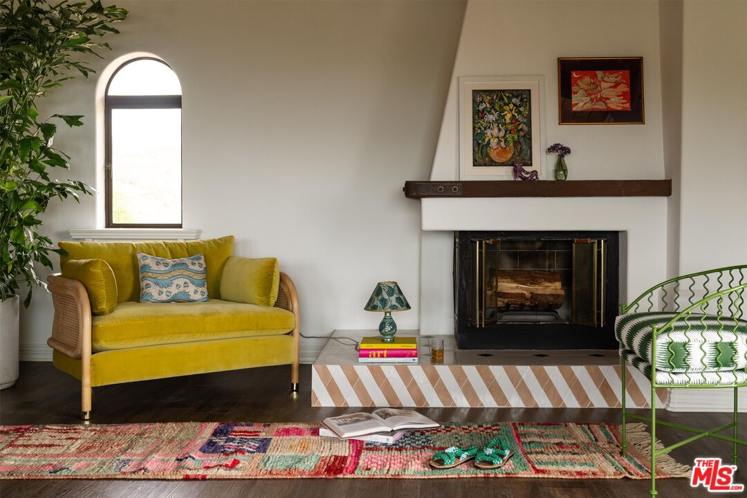 33261 Decker School Road Malibu, CA 90265 - Photo 21 of 32 a living room with furniture and a fireplace