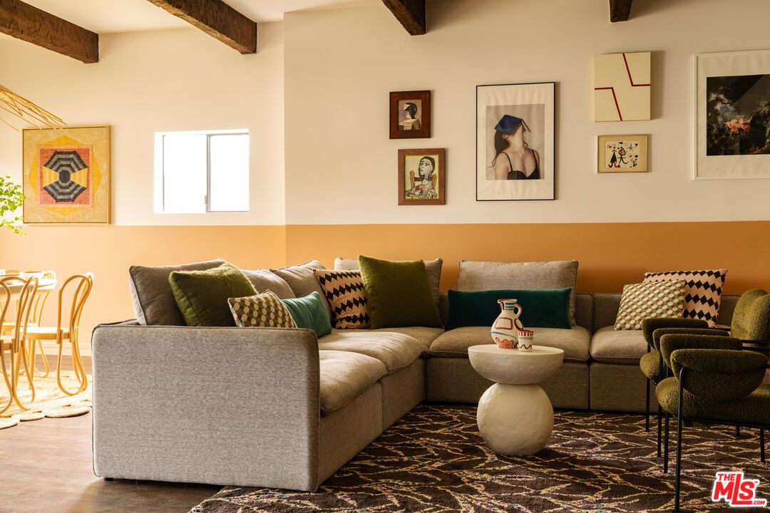 33261 Decker School Road Malibu, CA 90265 - Photo 28 of 32 a living room with furniture and wooden floor