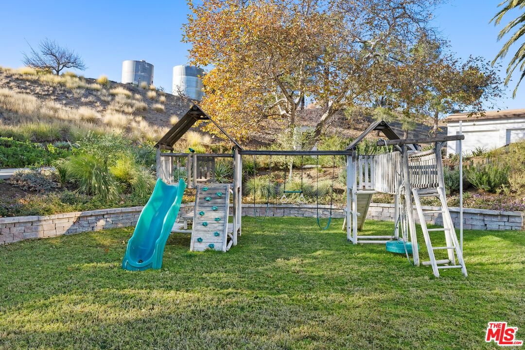 33261 Decker School Road Malibu, CA 90265 - Photo 32 of 32 a view of a garden with a slide