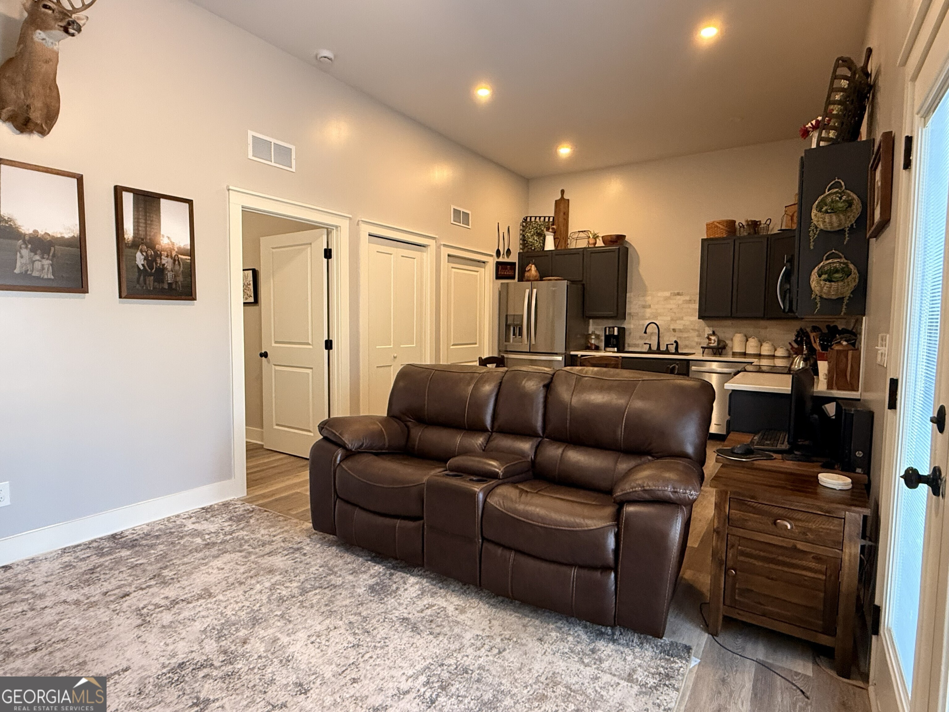 919 West Milner Road Concord, GA 30206 - Photo 39 of 40 a living room with furniture and wooden floor