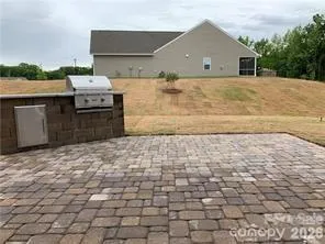 a view of a backyard of a house