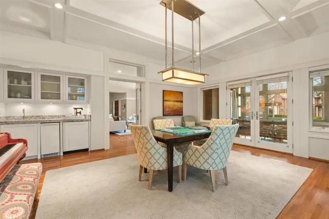 a bathroom with a double vanity sink a mirror and a shower