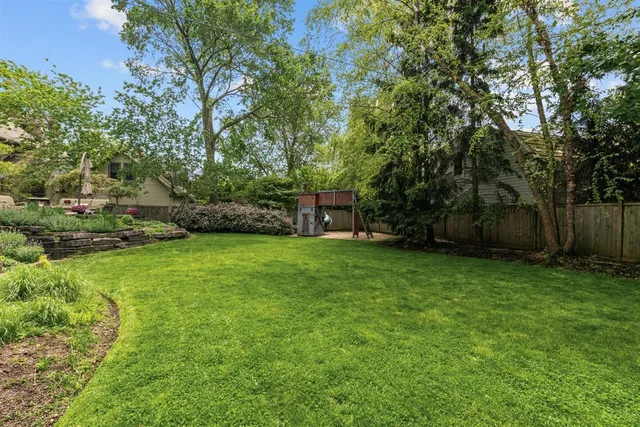 a view of a backyard with a garden