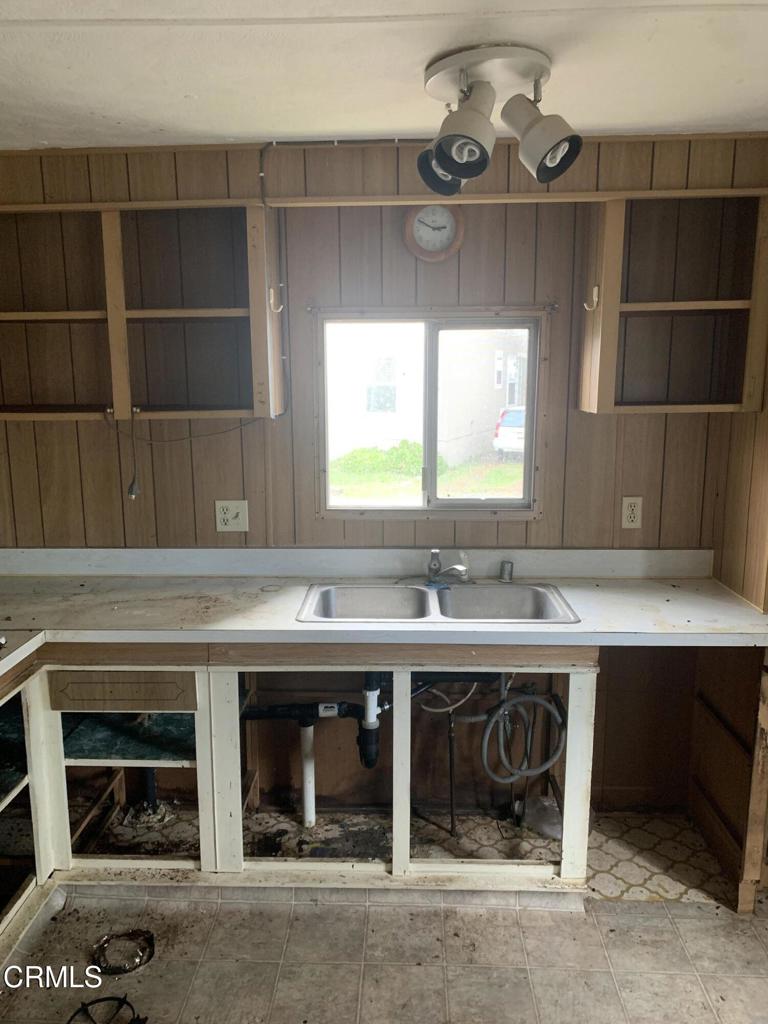 17900 Ocean Drive, Unit 40 Fort Bragg, CA 95437 - Photo 13 of 17 a kitchen with a sink and cabinets