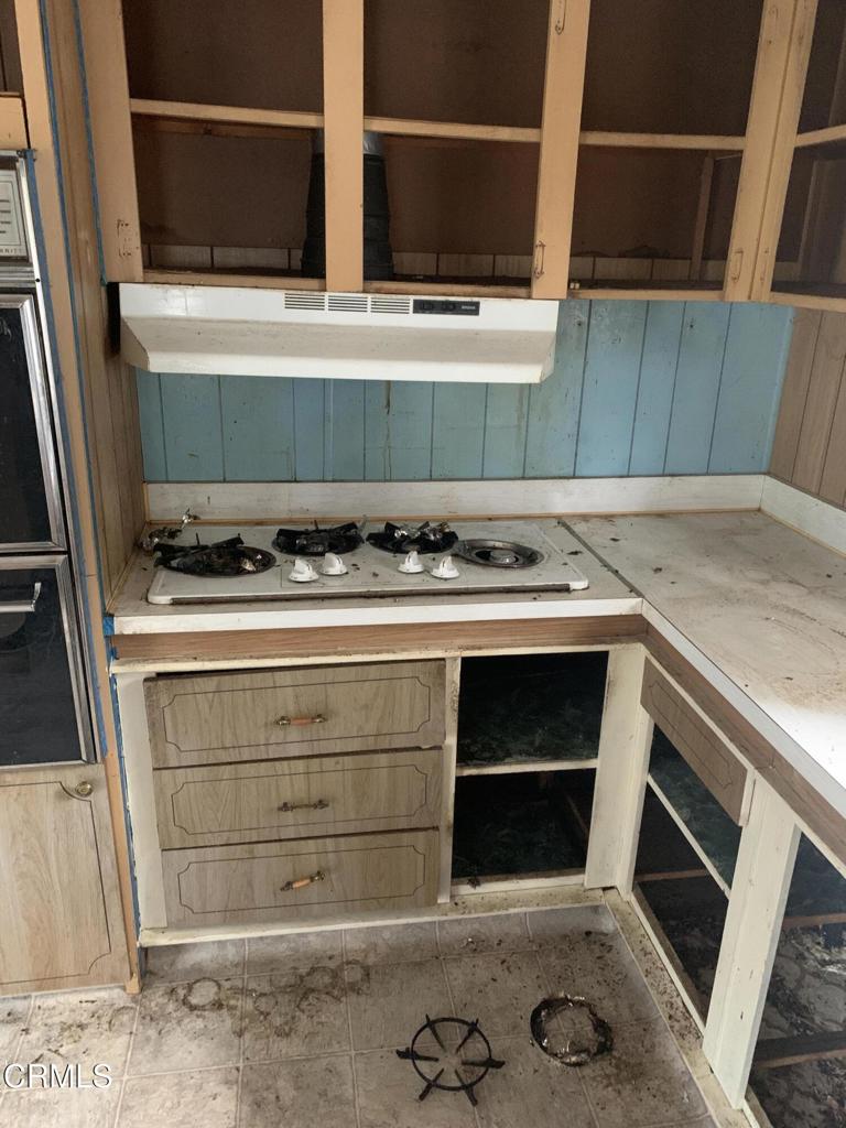 17900 Ocean Drive, Unit 40 Fort Bragg, CA 95437 - Photo 16 of 17 a stove top oven sitting inside of a kitchen