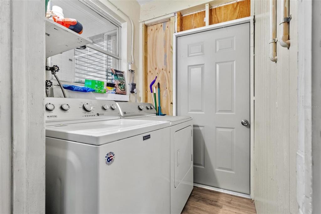 504 Milwaukee Avenue, Unit A Dunedin, FL 34698 - Photo 20 of 27 a bathroom with a sink and a mirror