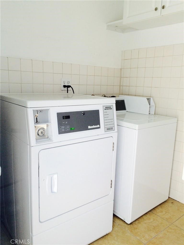 25091 La Cresta Drive Dana Point, CA 92629 - Photo 11 of 13 a utility room with dryer and washer