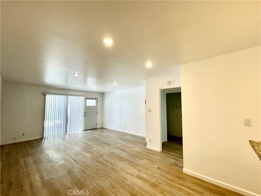 25091 La Cresta Drive Dana Point, CA 92629 - Photo 3 of 13 an empty room with wooden floor and windows