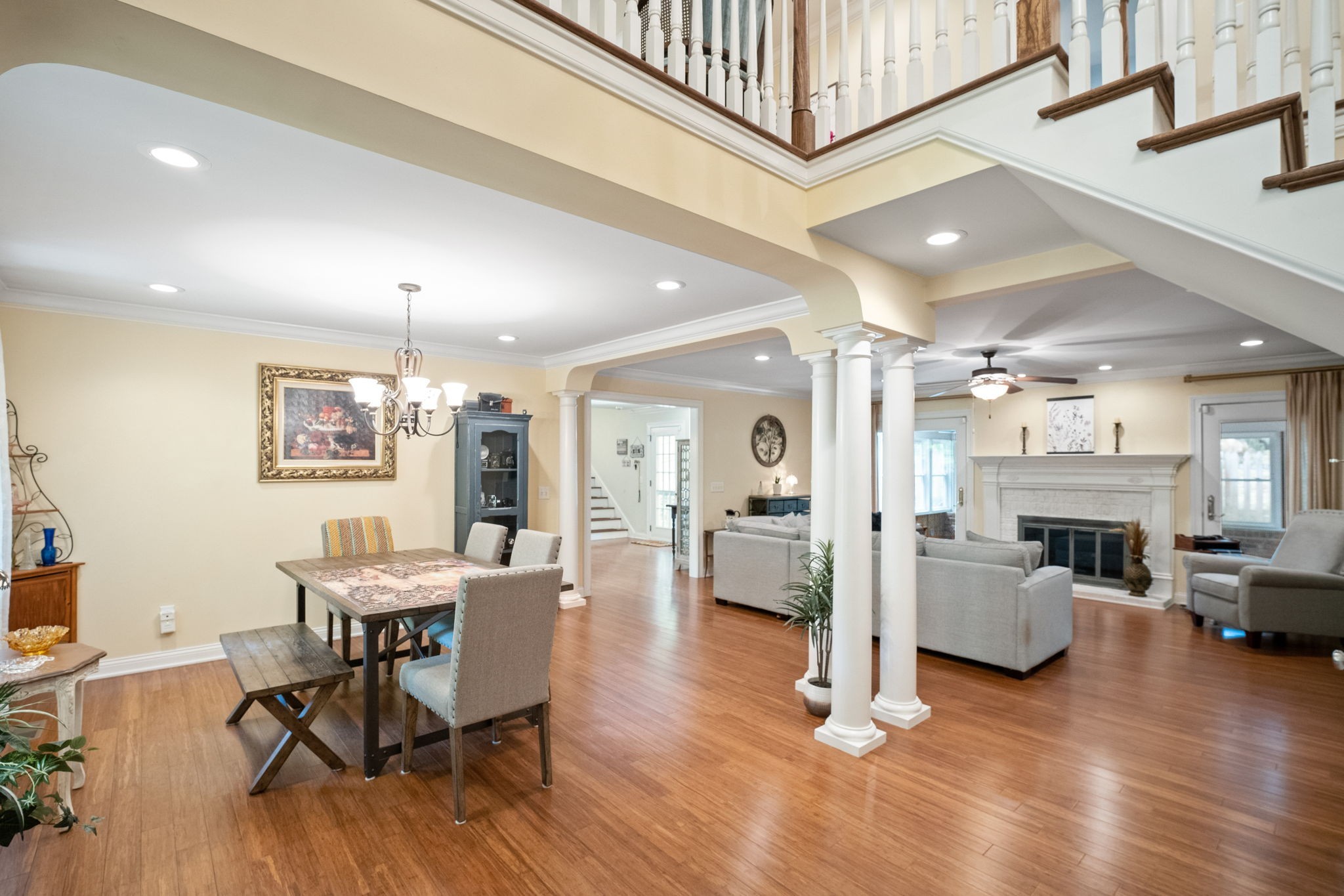 612 Fairway Trail Springfield, TN 37172 - Photo 12 of 50 a view of a dining room with furniture a chandelier and wooden floor