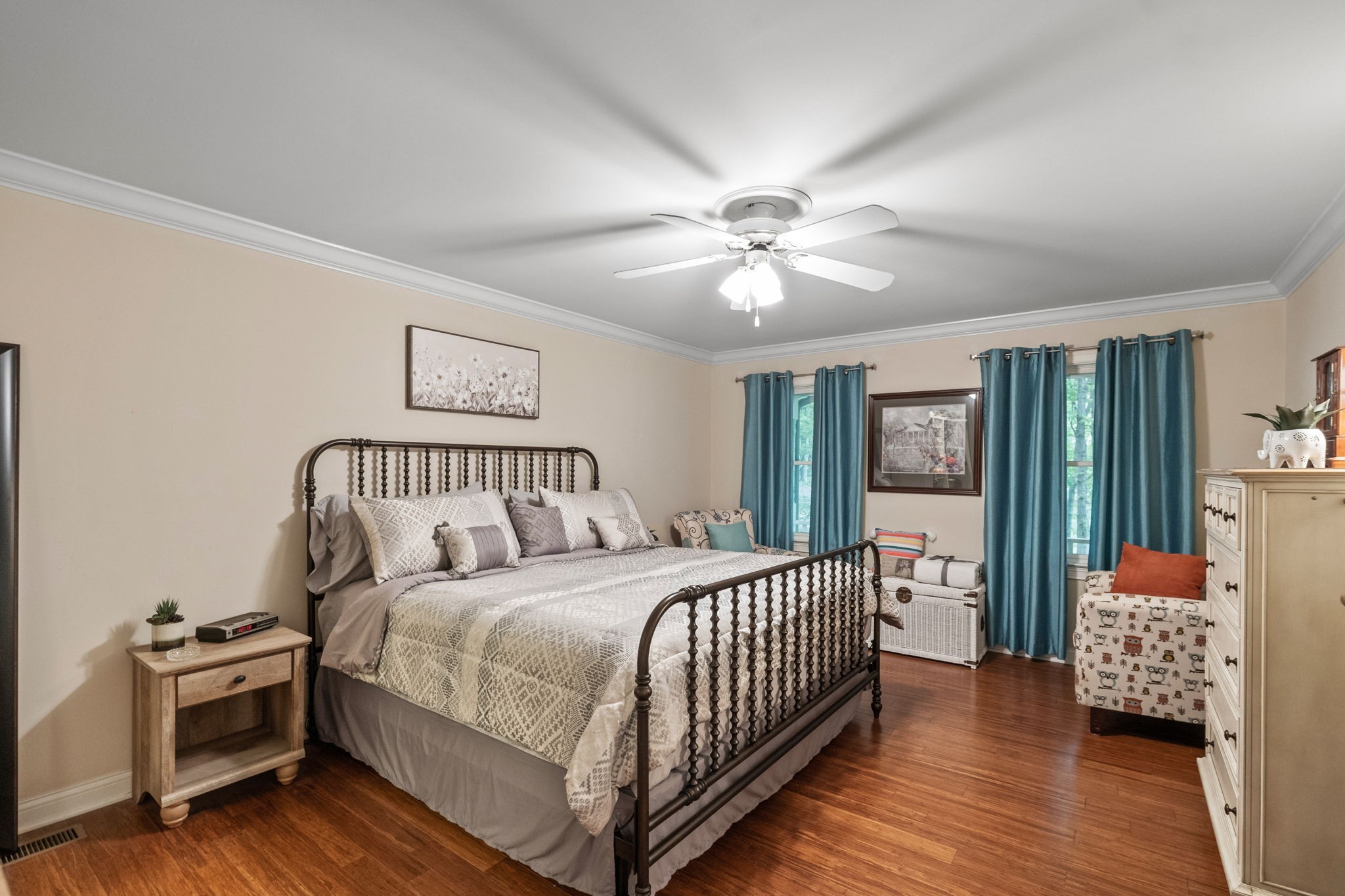 612 Fairway Trail Springfield, TN 37172 - Photo 14 of 50 a bedroom with a bed and a chandelier